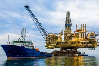 Offshore oil platform with supply ship