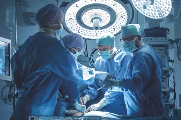 Surgeons performing an operation